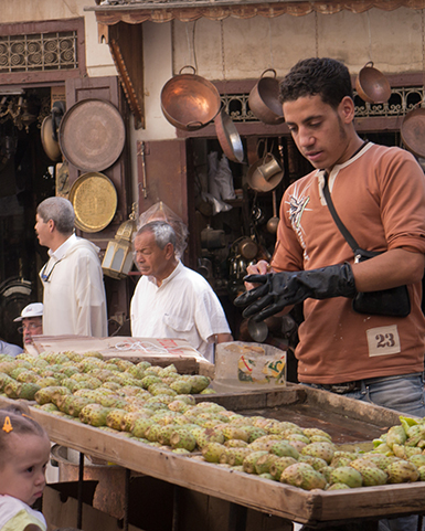 boy working in market in morocco